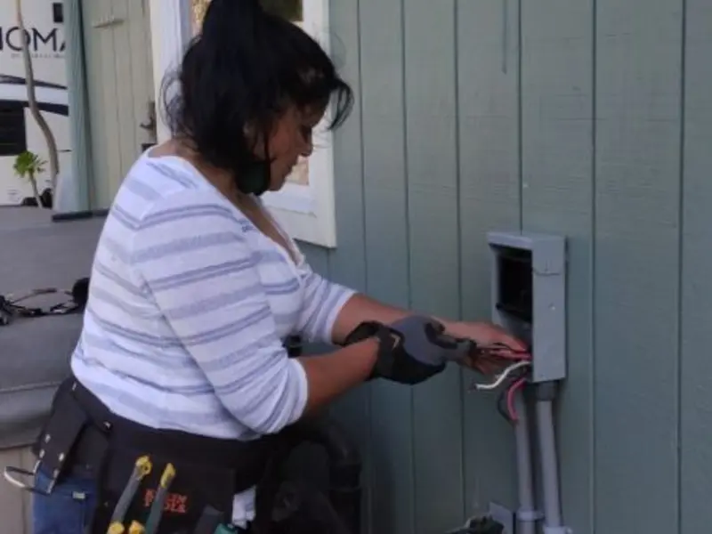 Licensed electrician wiring an exterior subpanel in Normandy Park